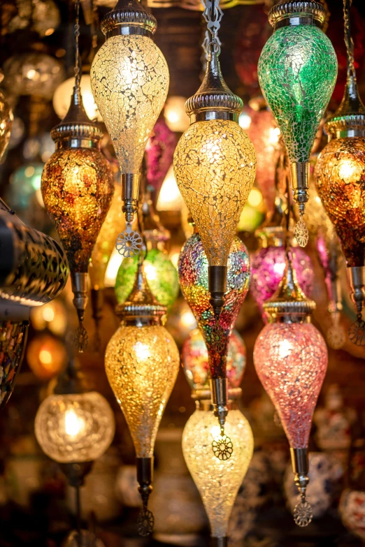 the hanging lights in this shop are colorful