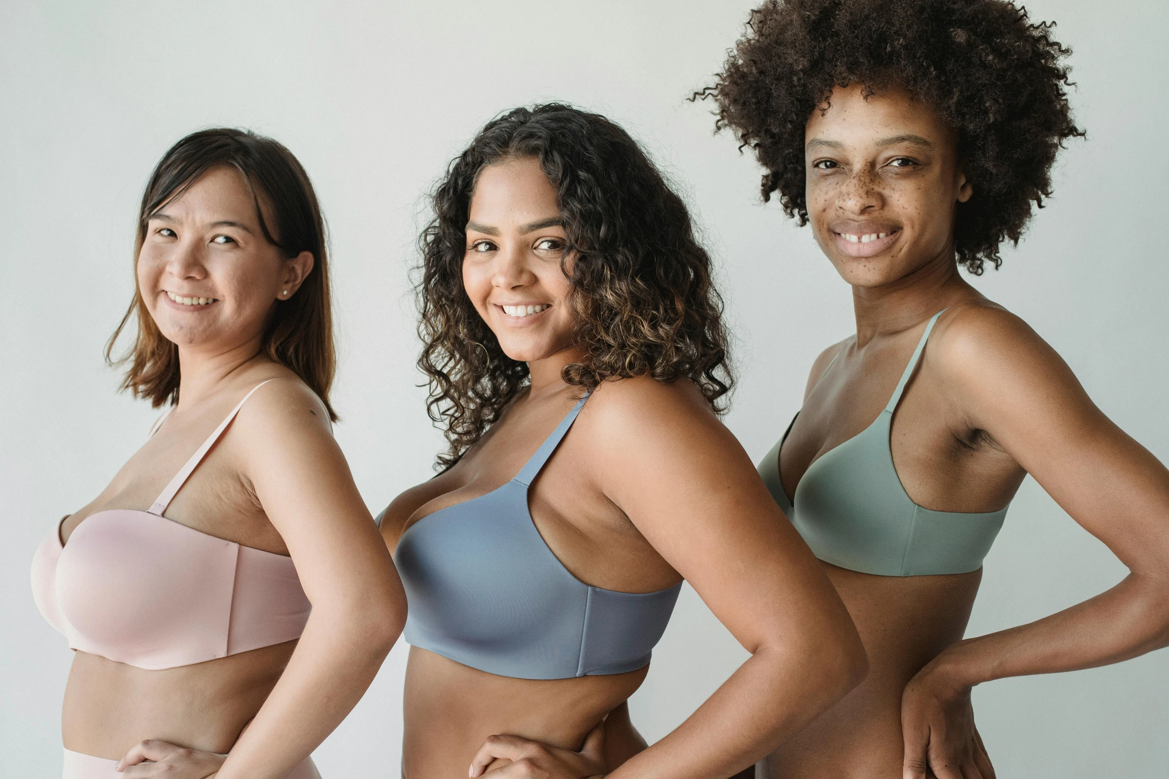 three women wearing s and panties standing together