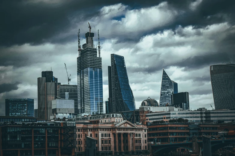 a city skyline is seen with tall buildings