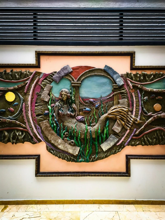 decorative wood art work on display on wall