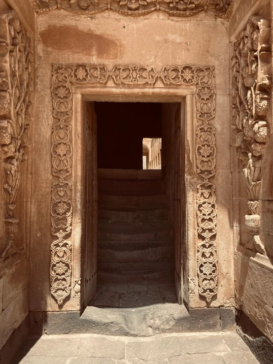 a stone door is shown in the center of a temple