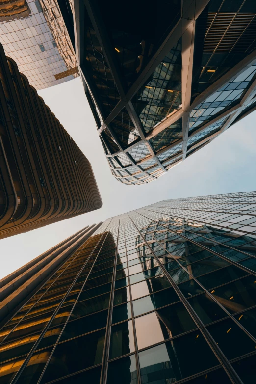 tall buildings in a city under a blue sky