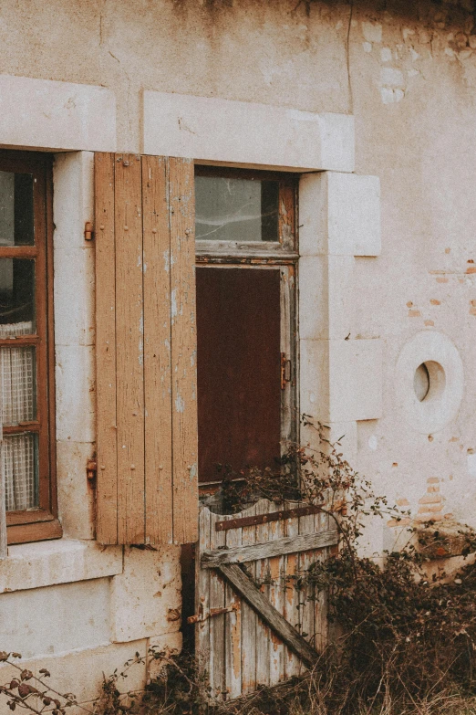 an abandoned building with the windows ed off