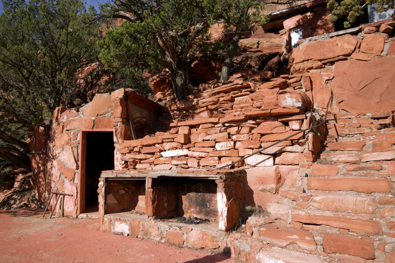 an old adobe building with its doorway made out of bricks