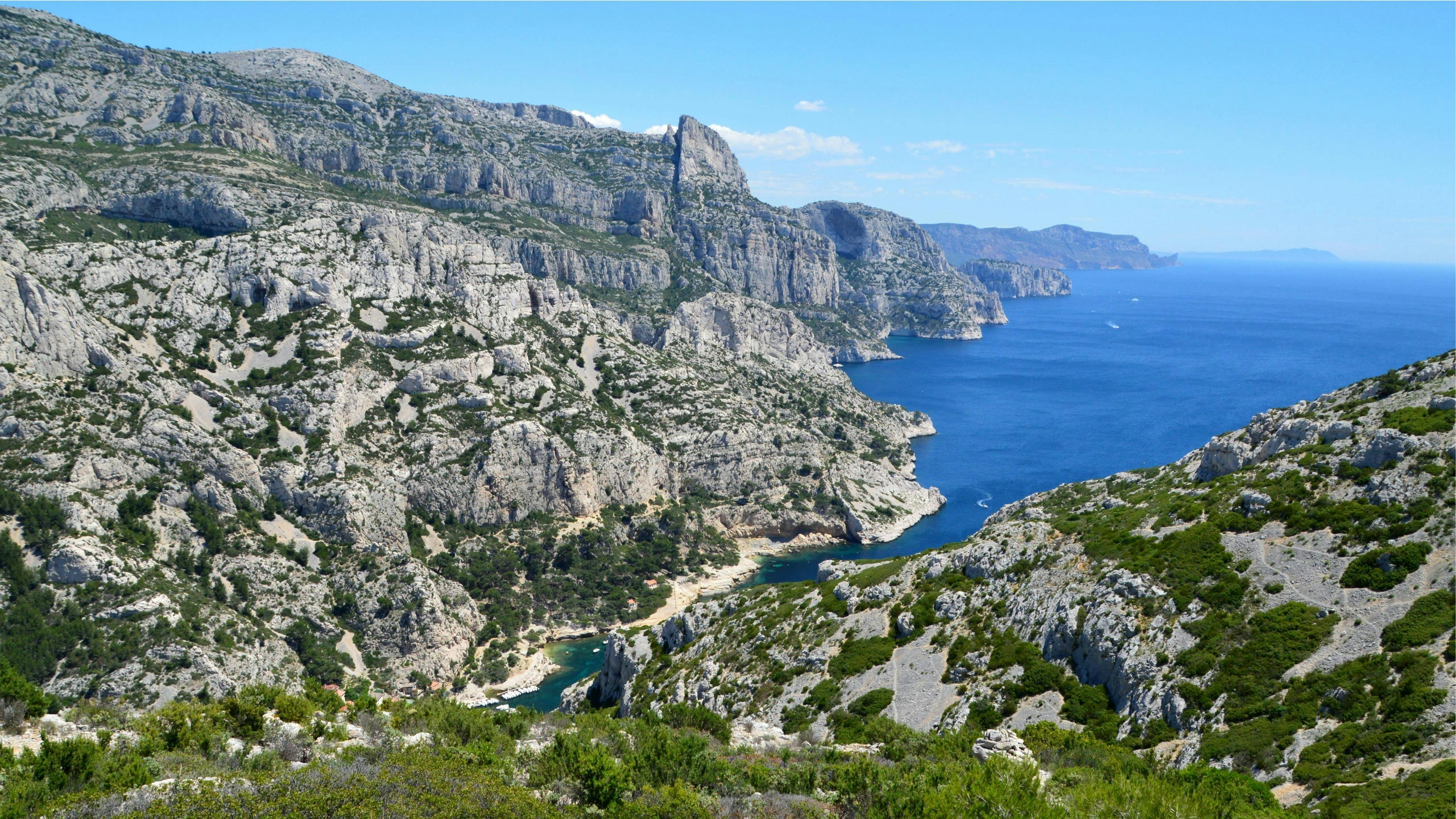 mountains with some blue water near by