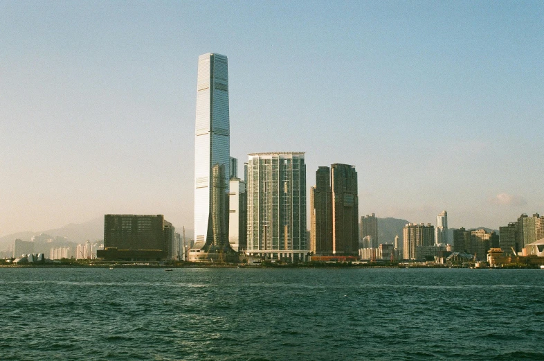 a large body of water next to the city