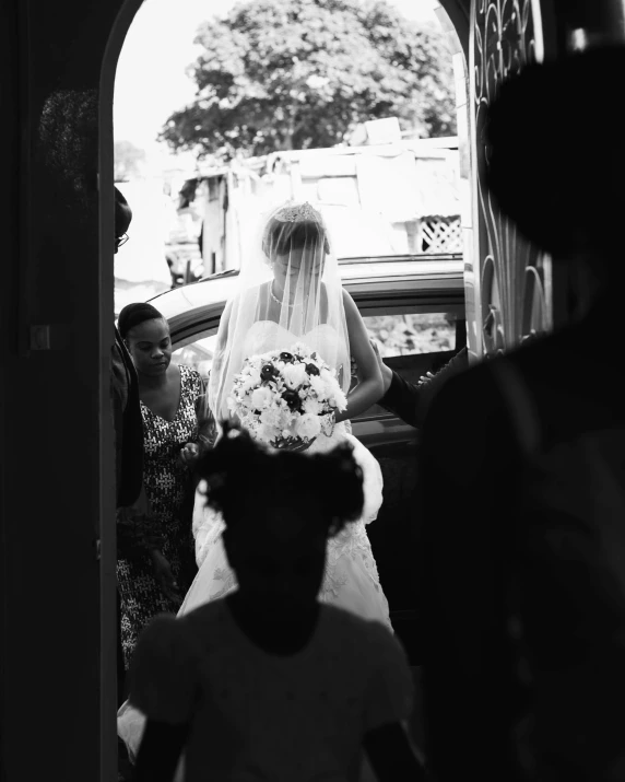 a bride and her father leaving the church together