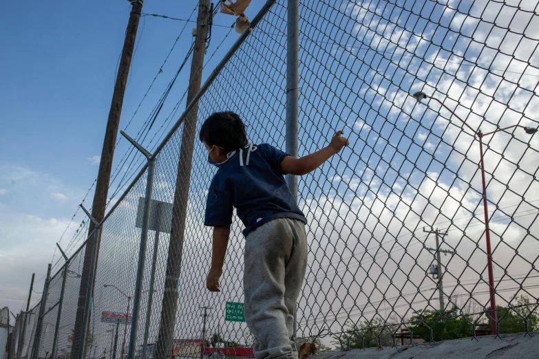 a young  playing on a skate board