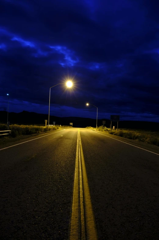 the empty road in the desert at night