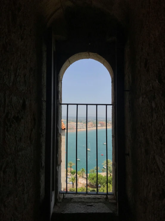 an archway that is opening into the view