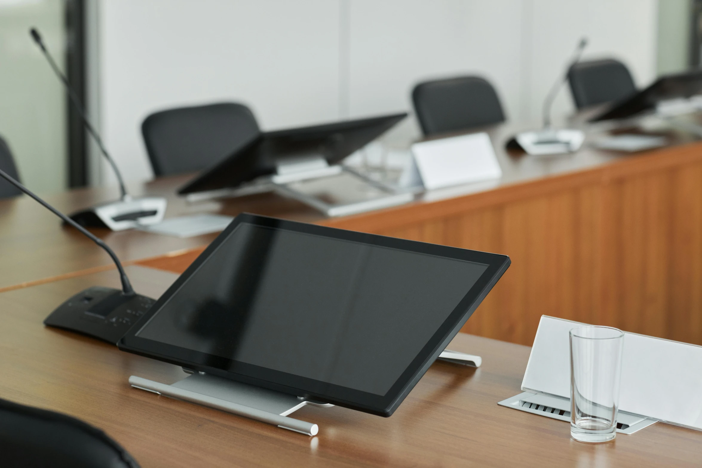 a table with a flat screen and tabletop on it