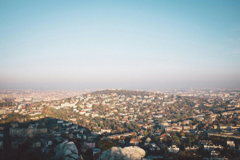 view of large city with mountains in the back