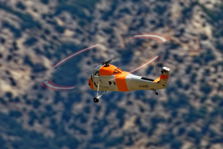 a small airplane flying through the sky