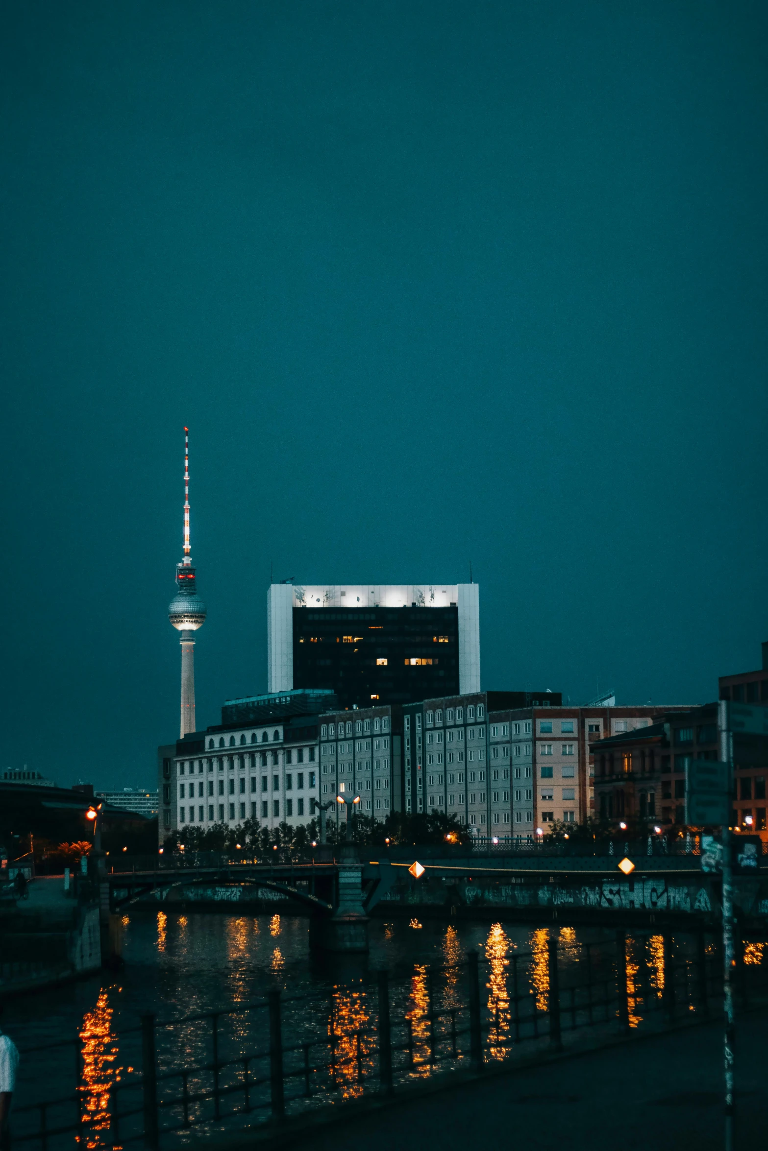 the skyline of dublin city and a bridge