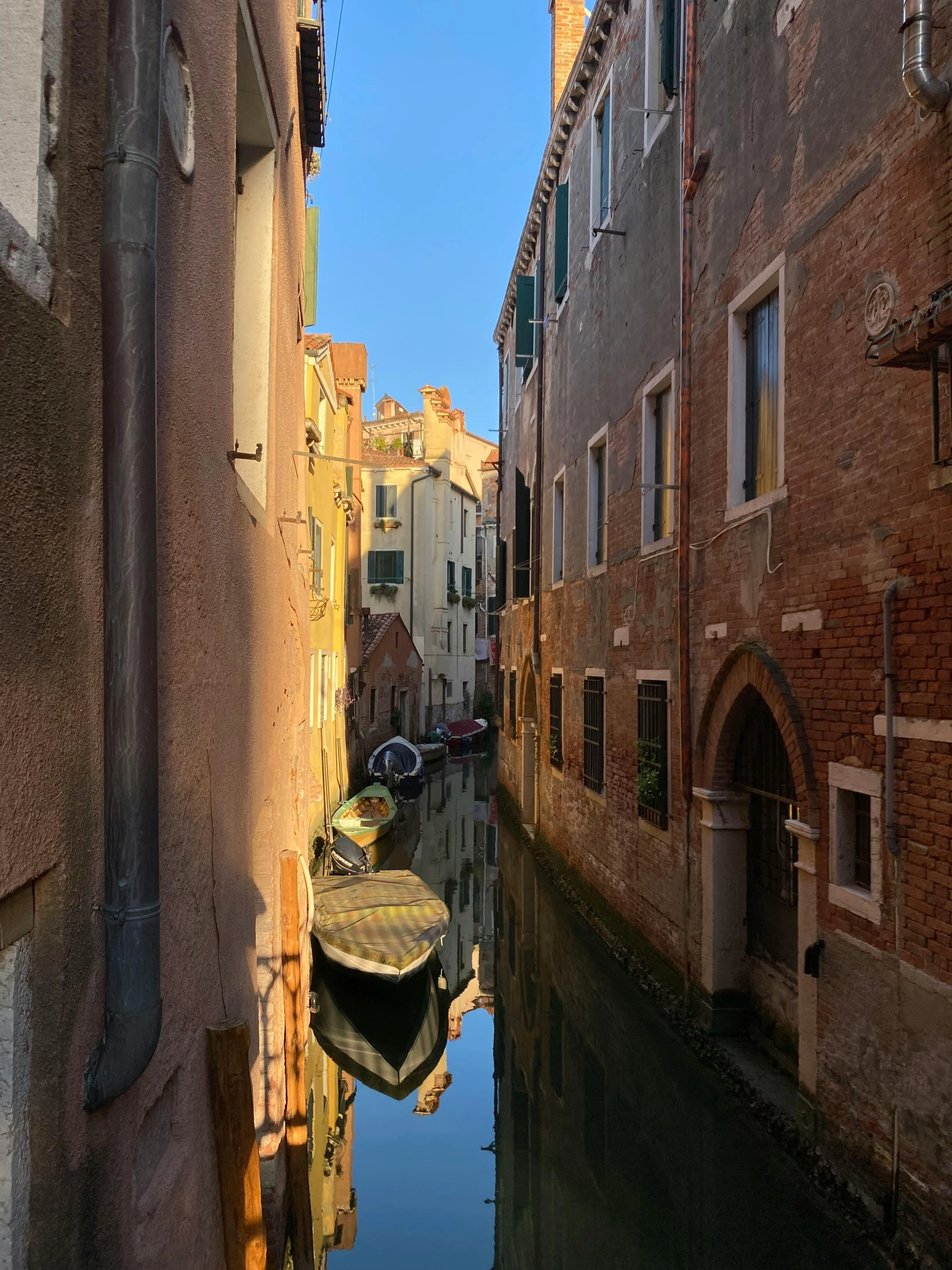 an empty waterway with boats in it is seen here