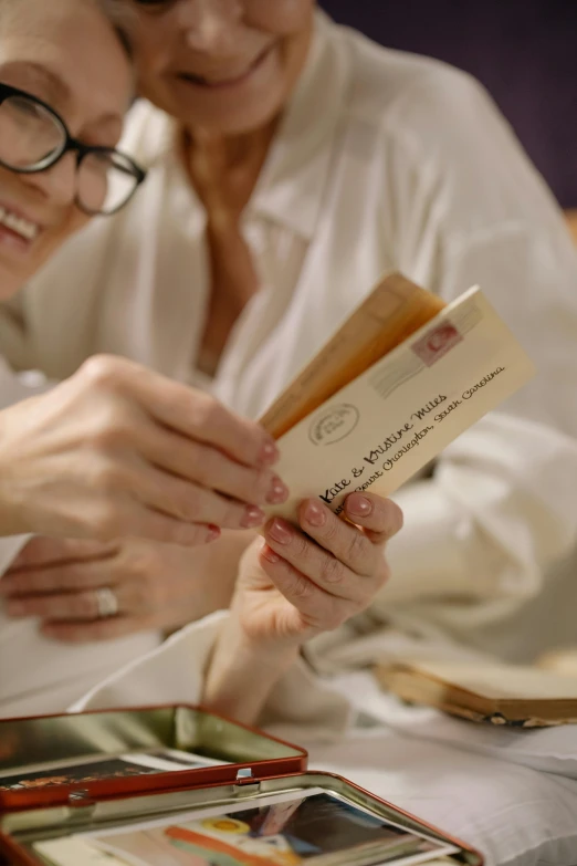 the woman shows the envelope from her grandmother