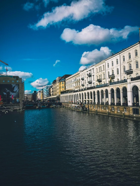 the water is still reflecting the historic buildings