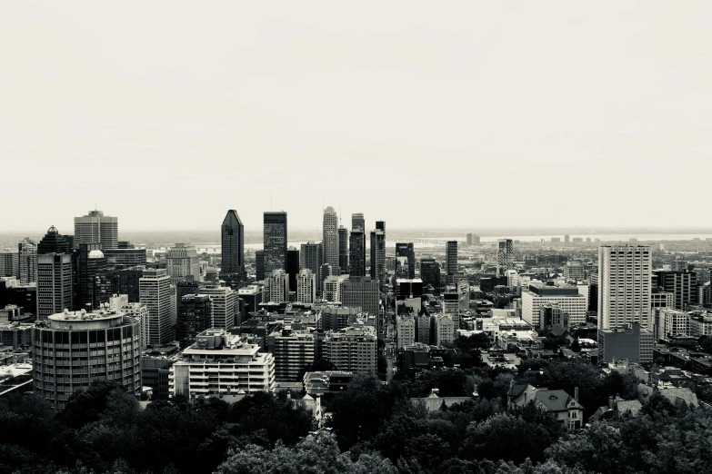 the city skyline is very high in black and white