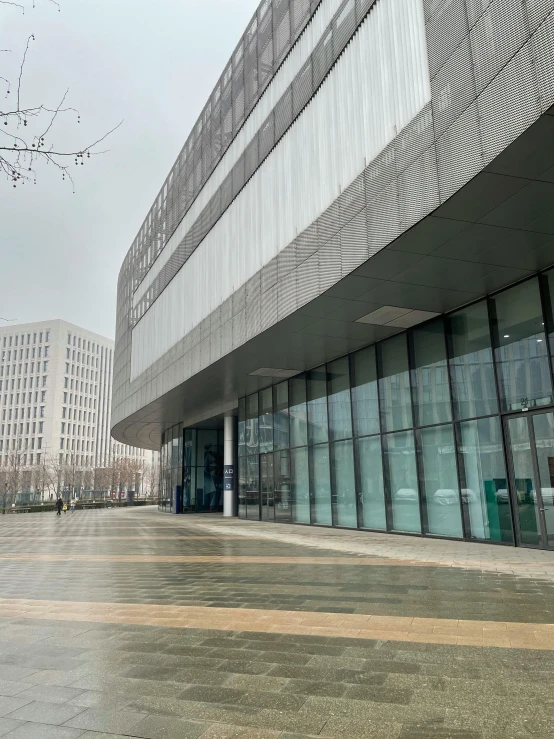 an image of people walking in front of a building