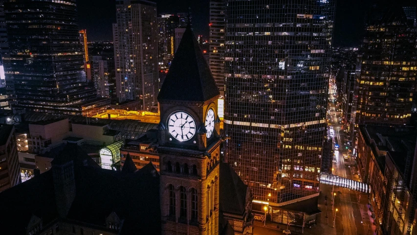 a view of a city from the top of a skyscr at night