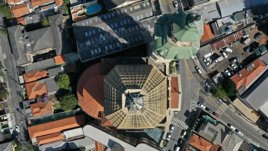 a city with some very pretty roofs and orange buildings