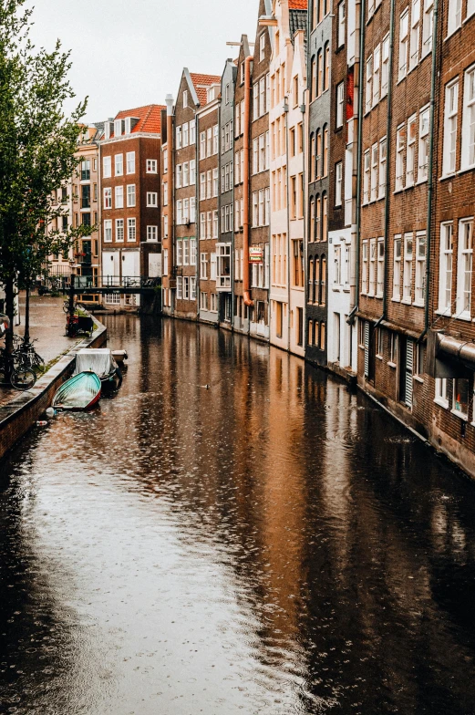 people on small boat ride down a canal