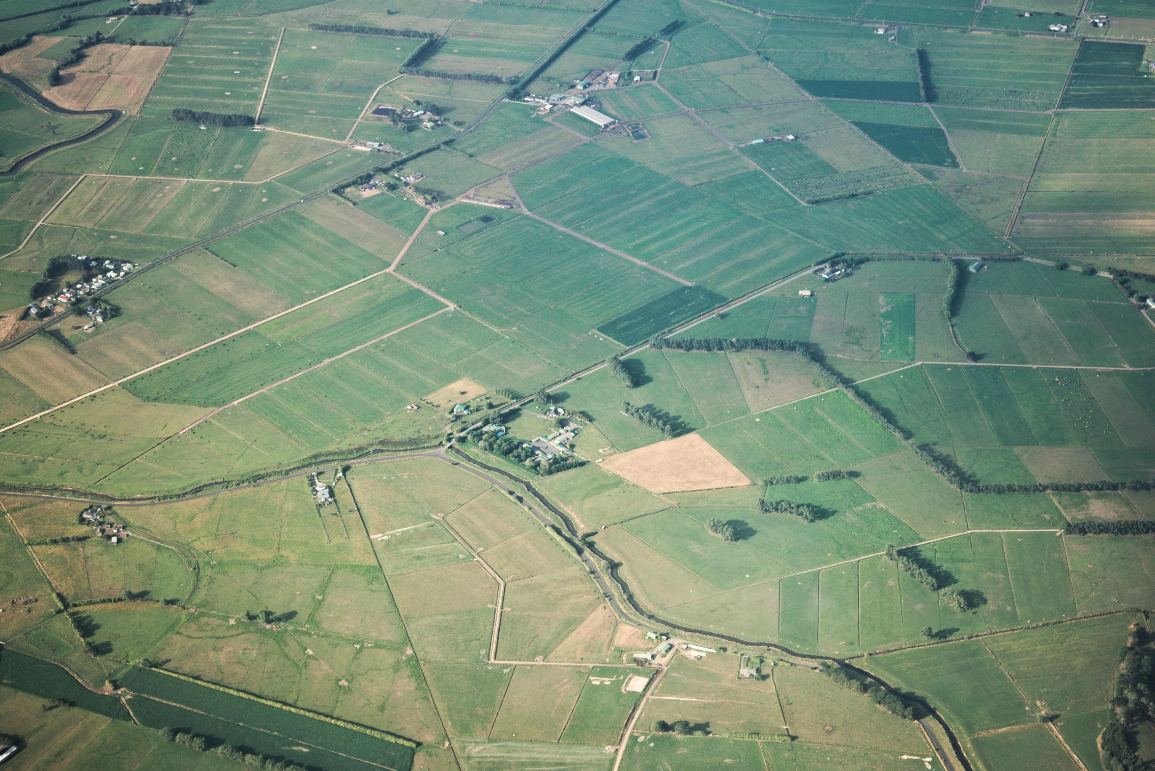 an aerial s of a green area with fields