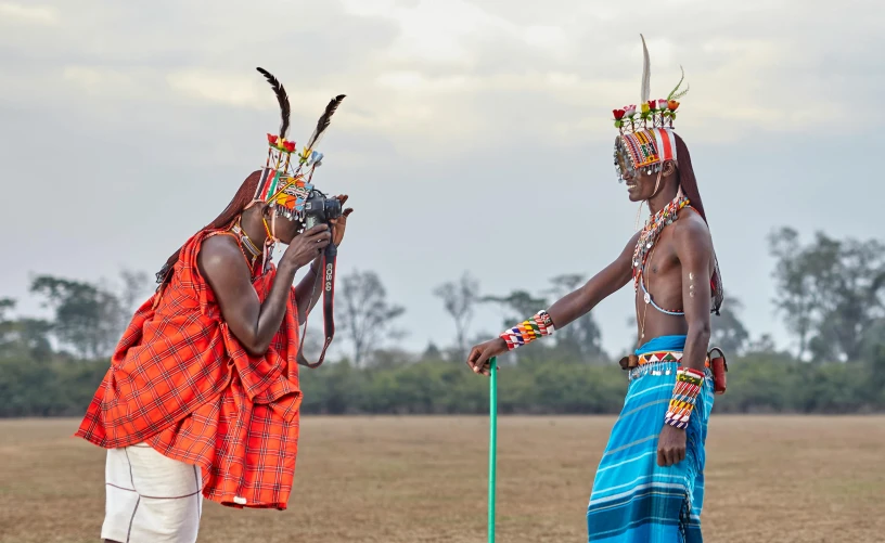 two african american indians are standing near each other