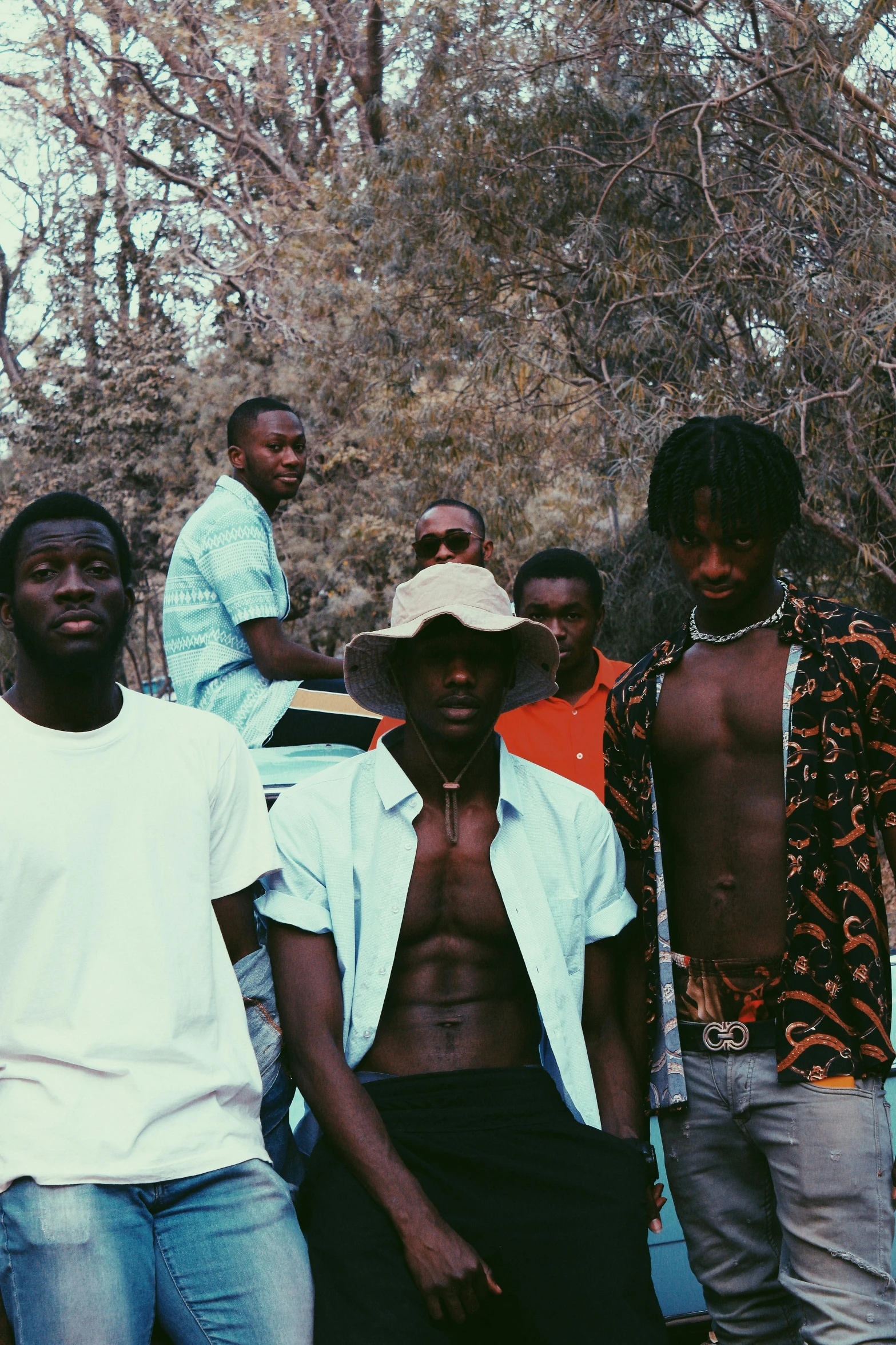 a group of young black people standing next to each other