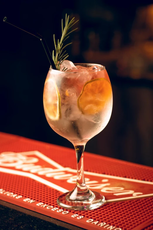 a drink in a glass on top of a table