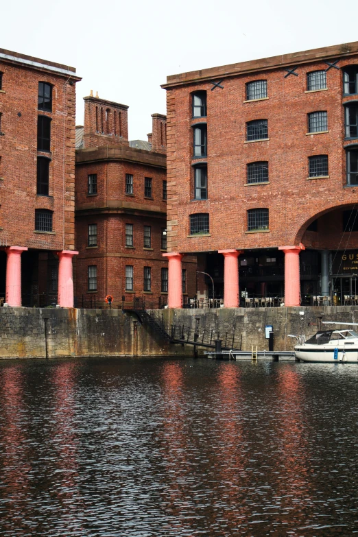 a boat is docked in a body of water