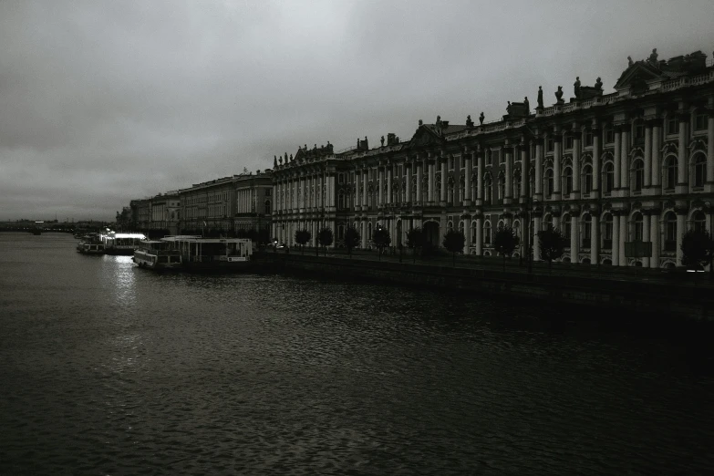 a row of buildings along the water's edge