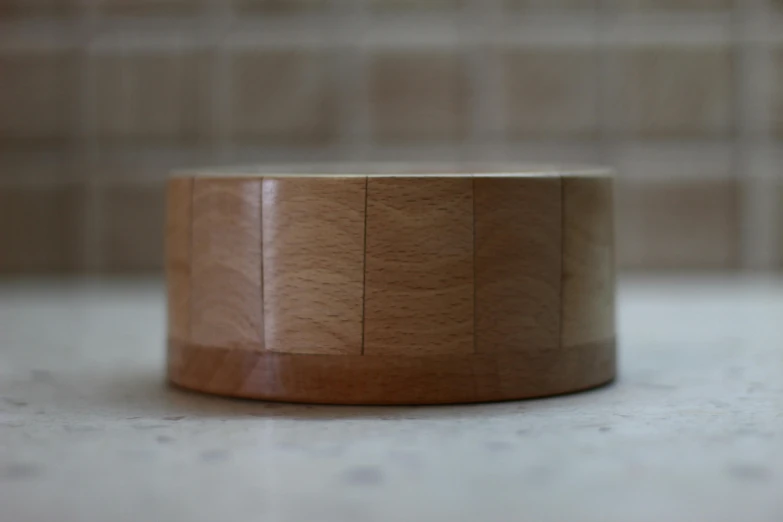 a wooden lid sitting on top of a counter