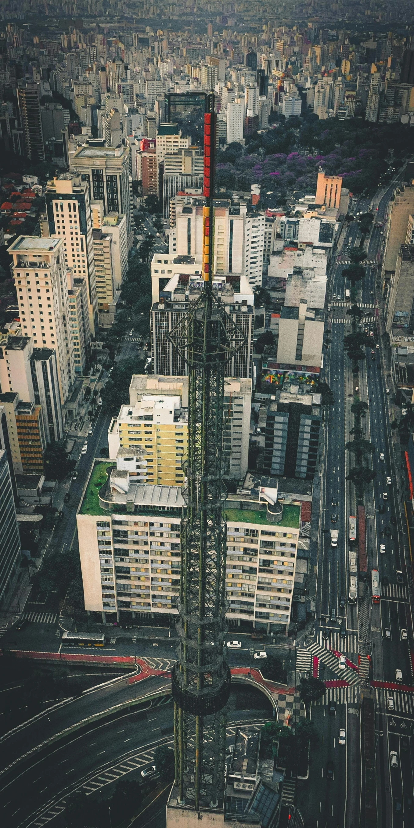 an aerial view of the city with high rise buildings