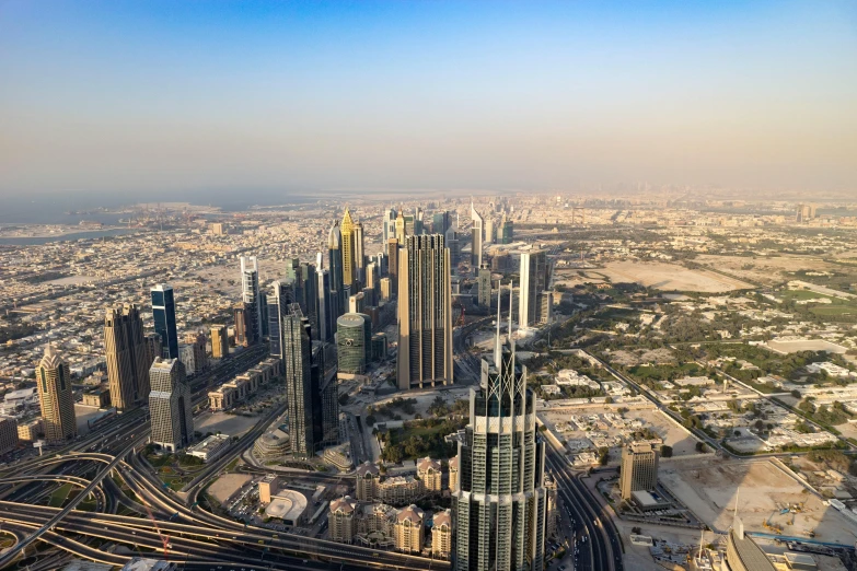 an aerial view of several tall buildings with skyscrs