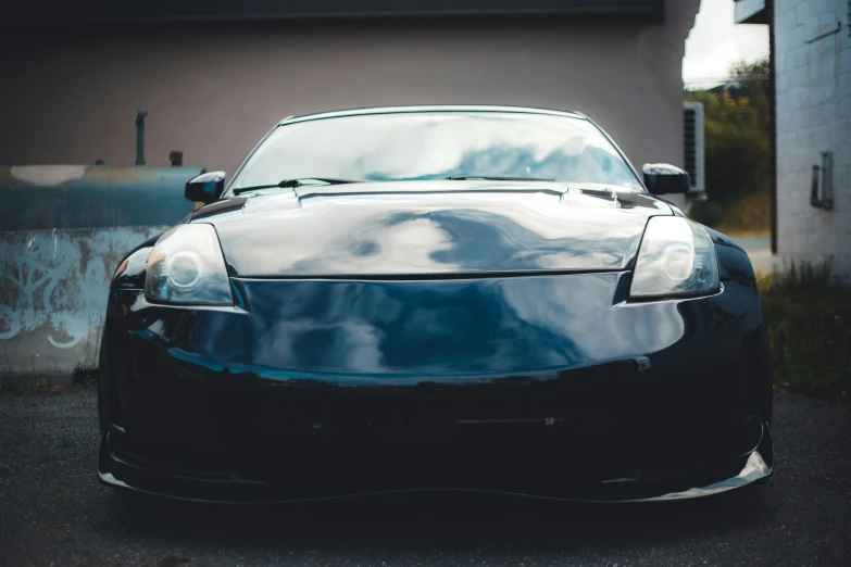 a close up of a car parked near a house