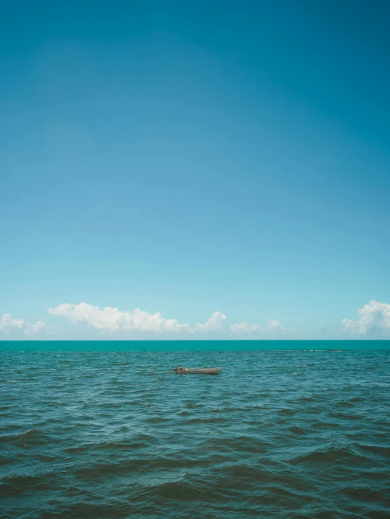 a boat out on the ocean off the coast