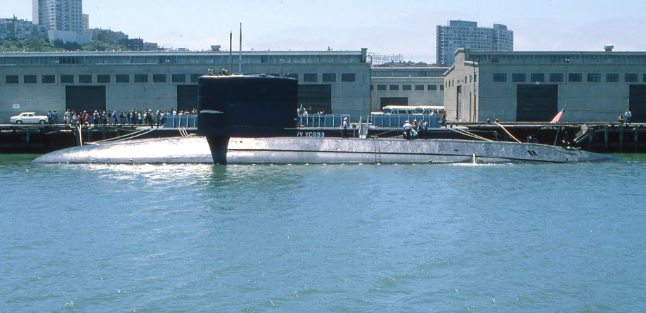 a submarine boat out at sea in the water
