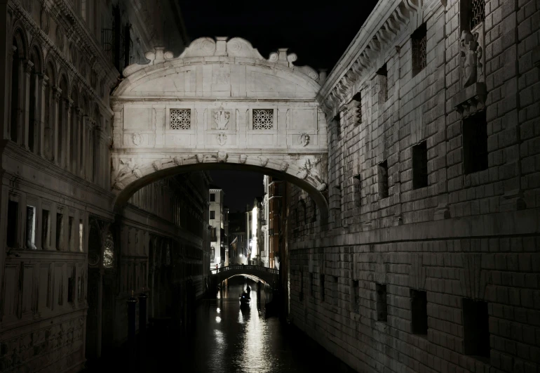 a bridge that is hanging over a river