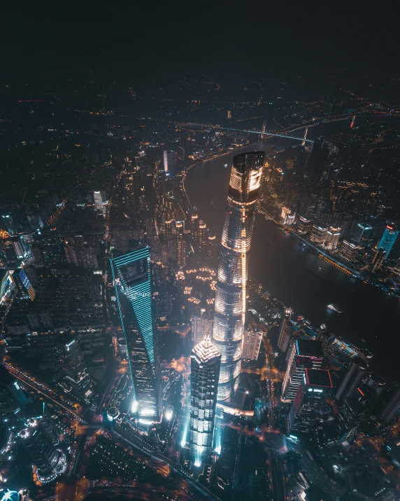 the view at night shows some very tall buildings