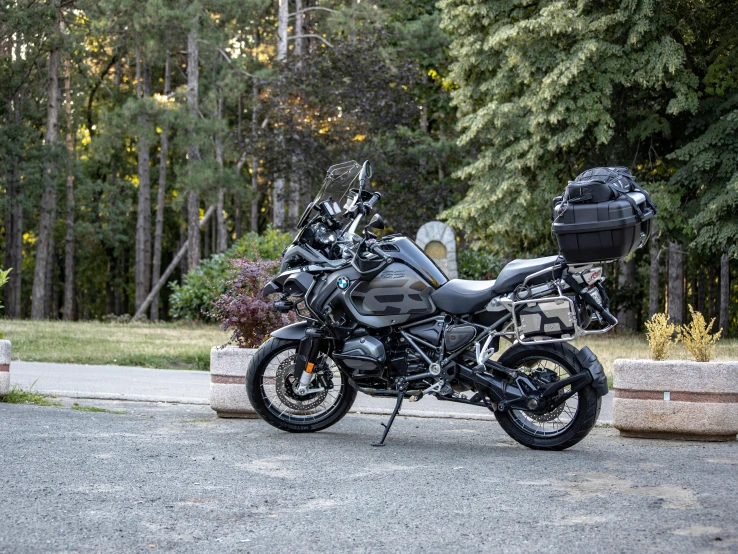 two motorcyles parked next to each other outside