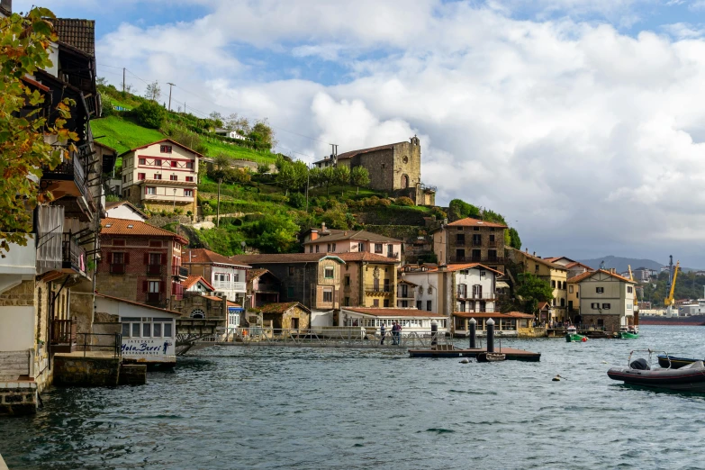 houses on the hillside on the lake shore