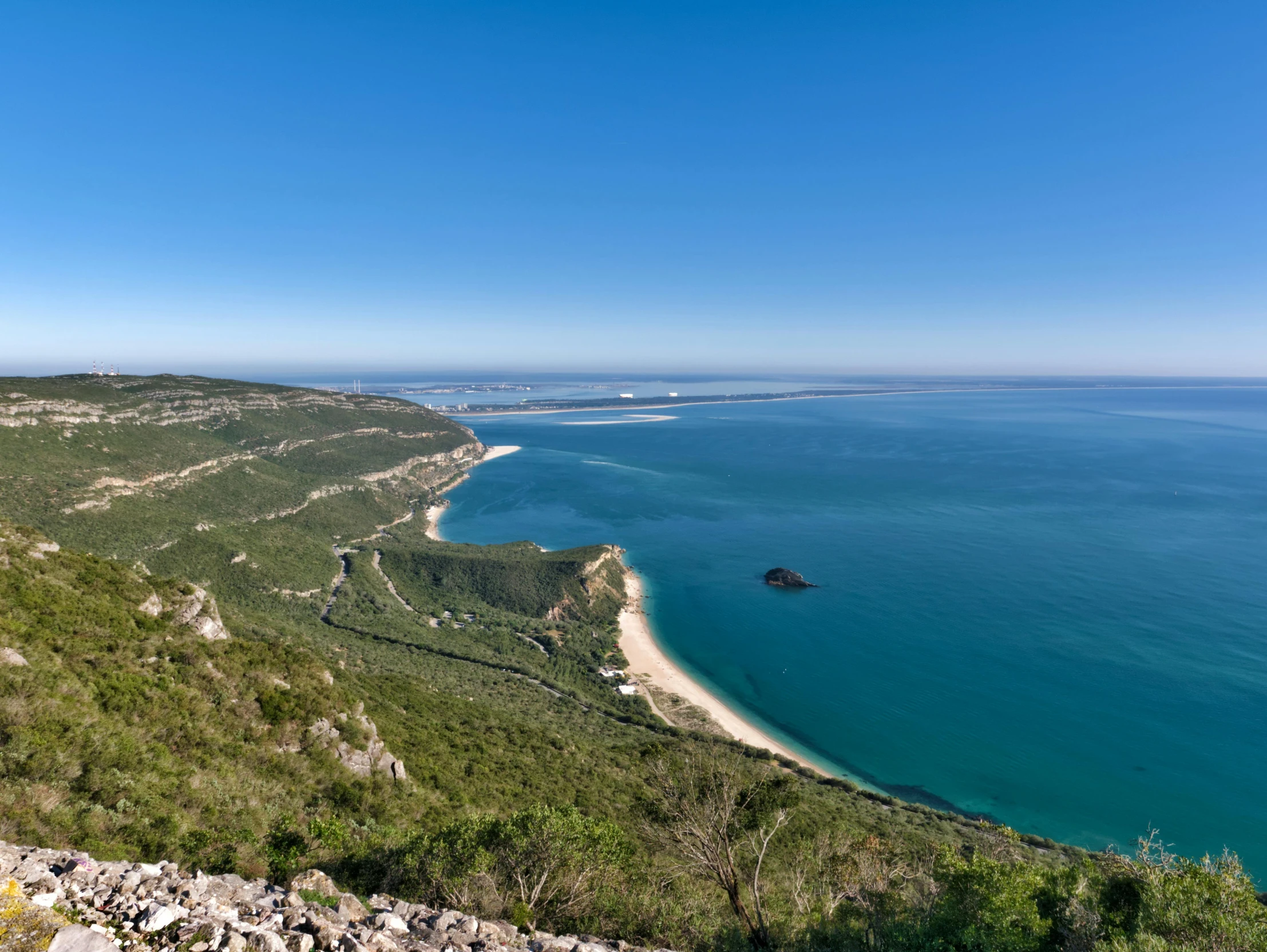 a large body of water surrounded by mountains