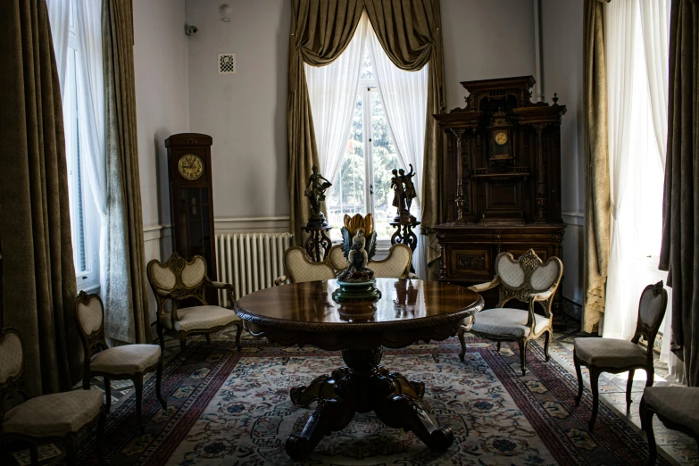 an ornate sitting room features classic furniture and period ds