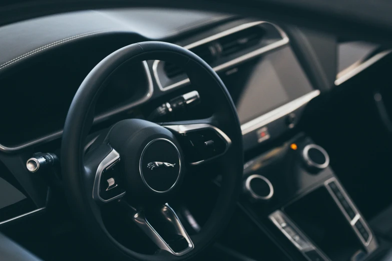 the view through the steering wheel of a vehicle