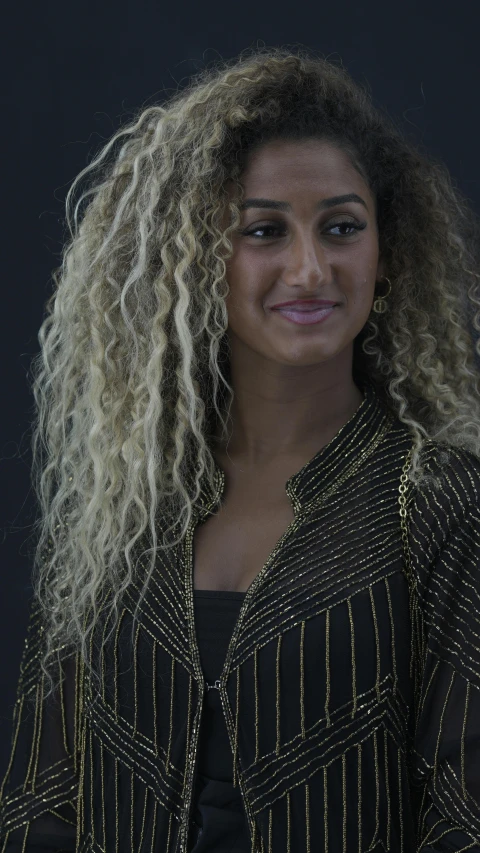 a very close up of a person wearing a blouse