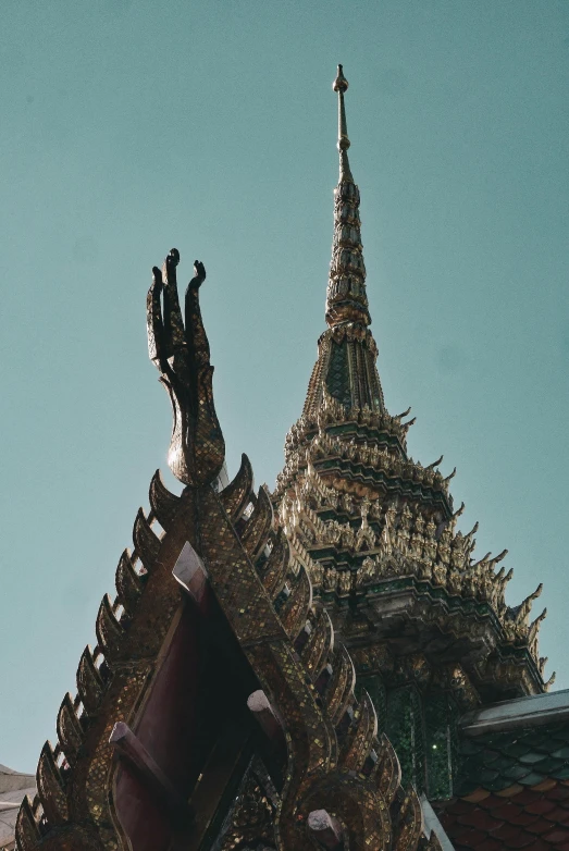 a large building has a very intricate roof