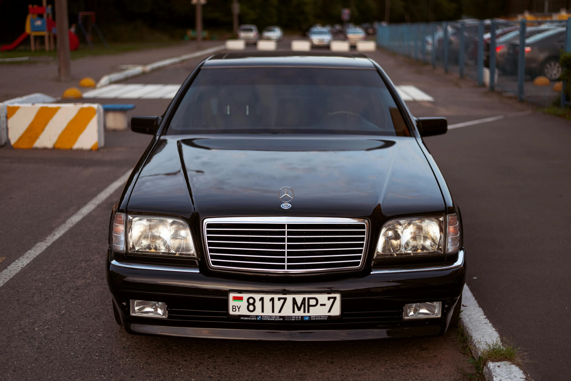 a mercedes s w16 sedan parked in an empty lot