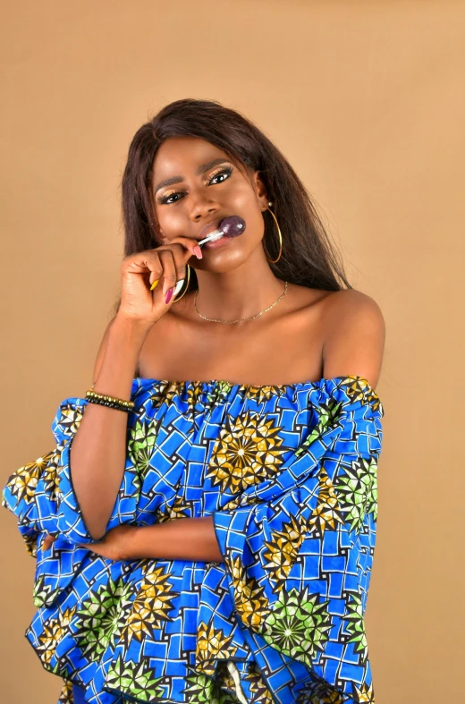 an african american woman in a blue blouse