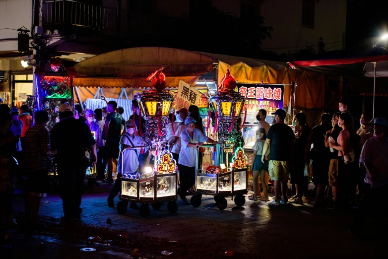 a display of fruit stands in the middle of the street